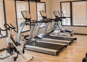 Thumbnail 13 of 17 - Woodcrest fitness center.