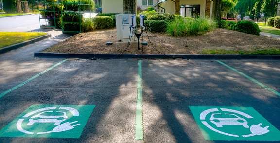 an electric vehicle charging station in front of a house