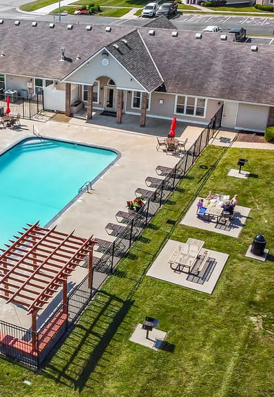 Aerial View Of The Pool Area With Pergola & Picnic Tables