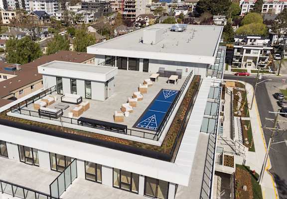 A modern house with a pool in the backyard.