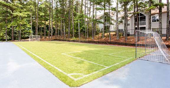 the tennis court at the residences at green gables at The Hub at 934 Apartments, Georgia, 30349