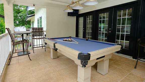 a pool table on the patio