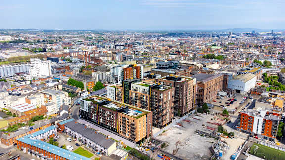 an aerial view of the city in the