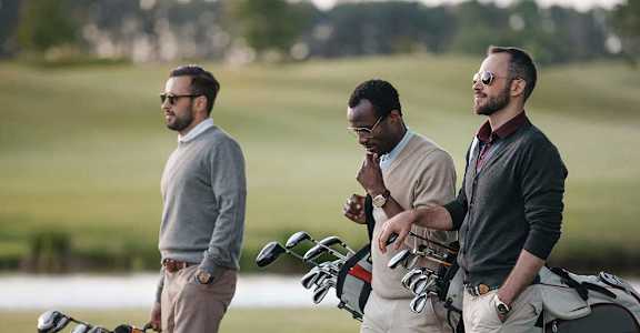three men standing on a golf course with their bikes at Tides at Mesa, Mesa, AZ, 85204