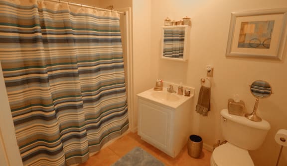 Model bathroom with beige tile