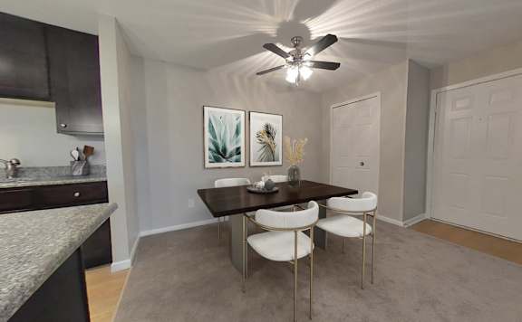 Dining rooms with overhead lighting and ceiling fan
