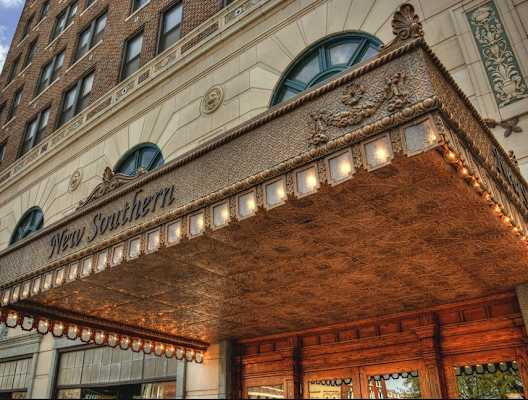 the front of New Southern Apartments in the evening
