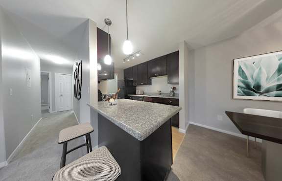 Deluxe 2-bedroom suites available with granite countertops and dark espresso cabinetry