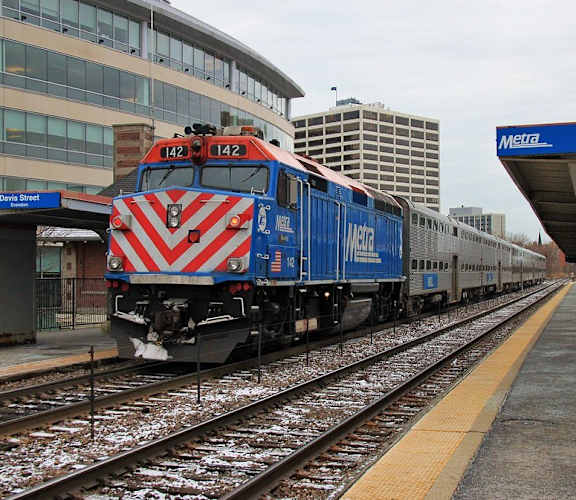 A train is on the tracks at Davis Street.
