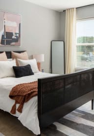 Bedroom with window and curtains at Alta Davis, Durham, North Carolina