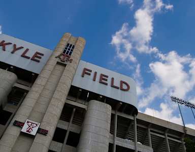 Kyle Field is a large stadium with a clear blue sky in the background.