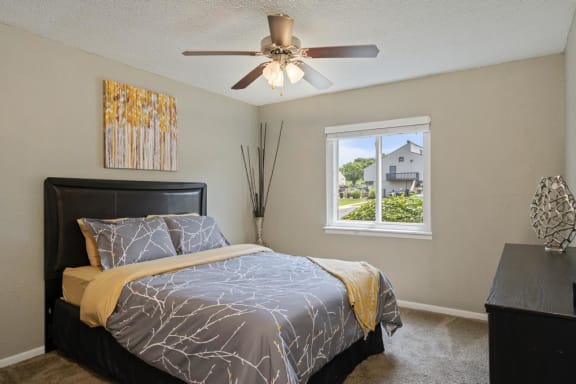 Bedroom With Ceiling Fan & Light