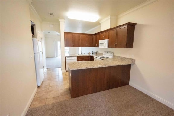 Granite Counter Tops In Kitchen at Dominion Courtyard Villas, Fresno, CA