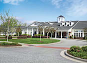 Thumbnail 6 of 6 - a large building with a street in front of it