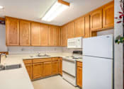 Thumbnail 15 of 22 - Fully Equipped Kitchen at Barcelona Apartments, California, 93277