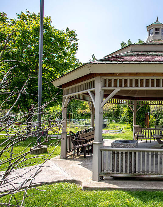 a gazebo with a cupola in a park