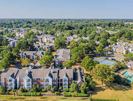 A bird's eye view of a residential area with houses and a swimming pool at The Trails at Mt. Moriah, Tennessee 38115