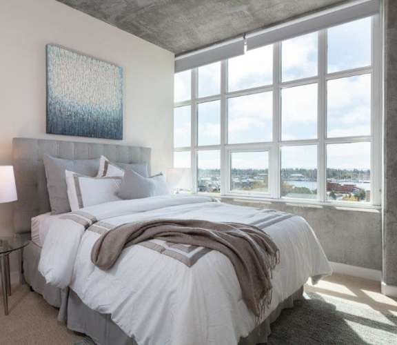 Bed at Aqua Via Apartments, Oakland, CA