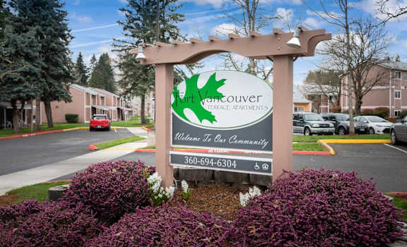 A sign for the Vancouver Apartment welcomes people to the community. at Fort Vancouver Terrace, Vancouver, WA, 98661