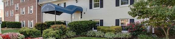 Another view of the entrance to leasing office and landscape