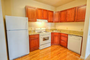 Kitchen with wooden cabinets