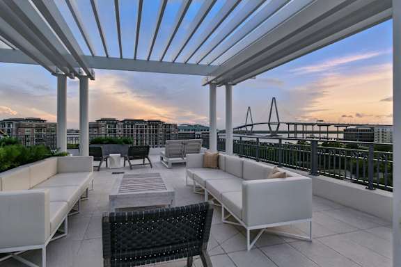 Expansive rooftop terrace with breathtaking views overlooking Charleston Harbor