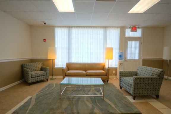Community lounge with seating area and coffee table