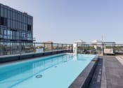 Thumbnail 13 of 14 - a view of the rooftop pool at the graduate madison hotel in madison, wi