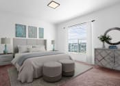 Thumbnail 7 of 9 - A bedroom with a large bed, two nightstands, and a window with blinds.