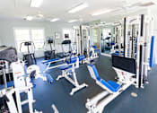 Thumbnail 2 of 18 - Inside the fitness center at Harbour Breeze Apartments