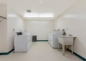 Thumbnail 5 of 10 - Laundry Room at Hickory Village