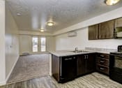 Thumbnail 1 of 27 - Kitchen into living room