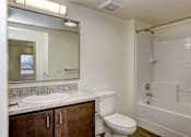 Thumbnail 11 of 27 - Bathroom with tub