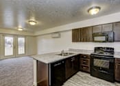 Thumbnail 7 of 27 - Kitchen with external doors