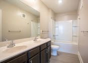Thumbnail 6 of 13 - Double Sinks with Shower Storage