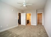 Thumbnail 4 of 13 - Master Bedroom with Private Bathroom