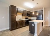 Thumbnail 8 of 13 - So Much Cabinet Storage and Open Kitchen