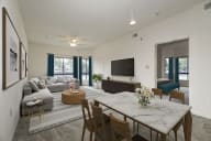 our apartments offer a living room with a fireplace and a dining table