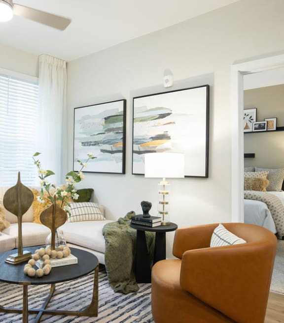 a living room with a couch and a table