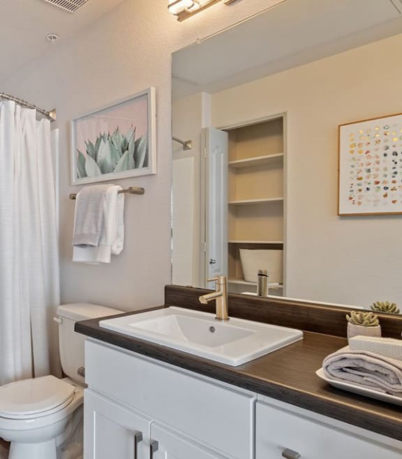 a bathroom with a sink toilet and a shower at Element Deer Valley in Phoenix, Arizona