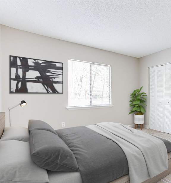 a bedroom with a bed and a door to a living room at Lory of Harbison, Columbia, SC