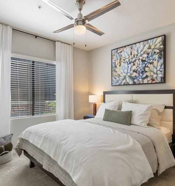 a bedroom with a bed and a ceiling fan at Element Deer Valley in Phoenix, AZ 85027