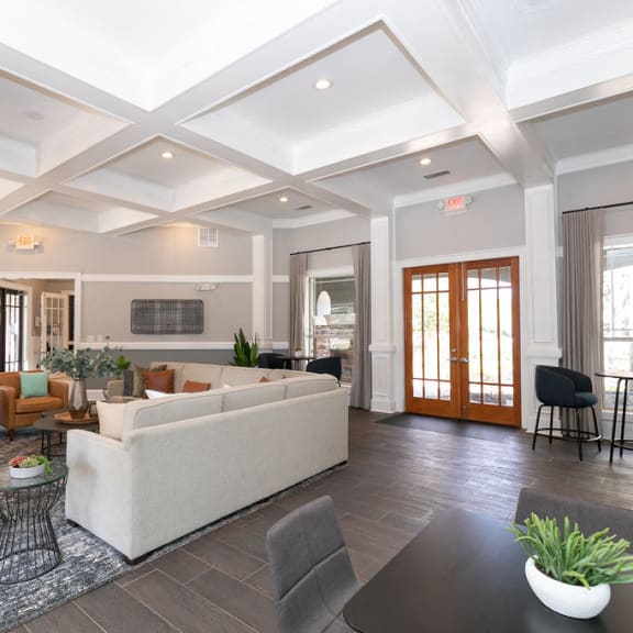 a living room with a couch and a table at Deerfield Village in Alpharetta, 30004