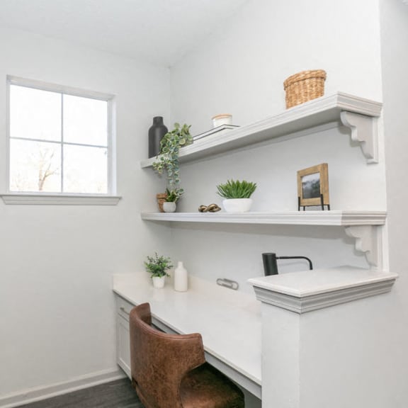 a small kitchen with a refrigerator and a window at Deerfield Village in Georgia 30004