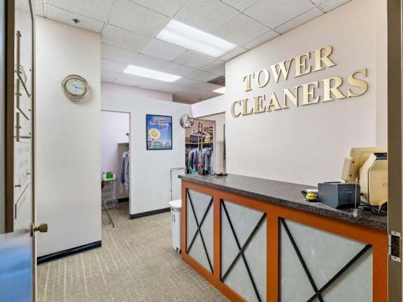 A cleaning service office with a clock on the wall.