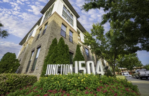 a building with a sign that says junction 150a in front of it