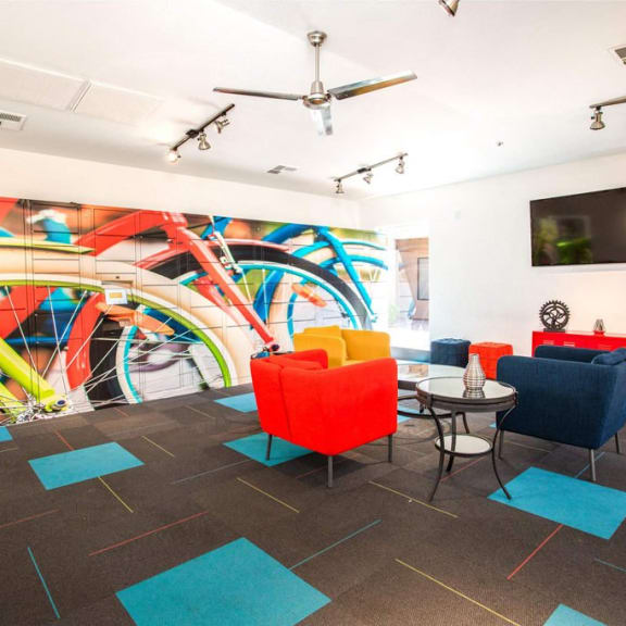 a room with a bike mural on the wall