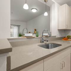 a kitchen with a sink and a counter top