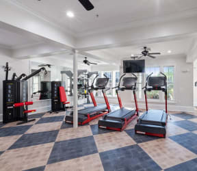 a home gym with a black and white checkered floor  at Harper's Crossing, Langhorne, Pennsylvania