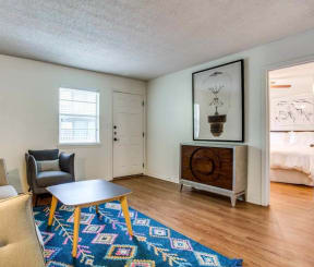 living room with a couch and a table at THE EASTWOOD, Texas